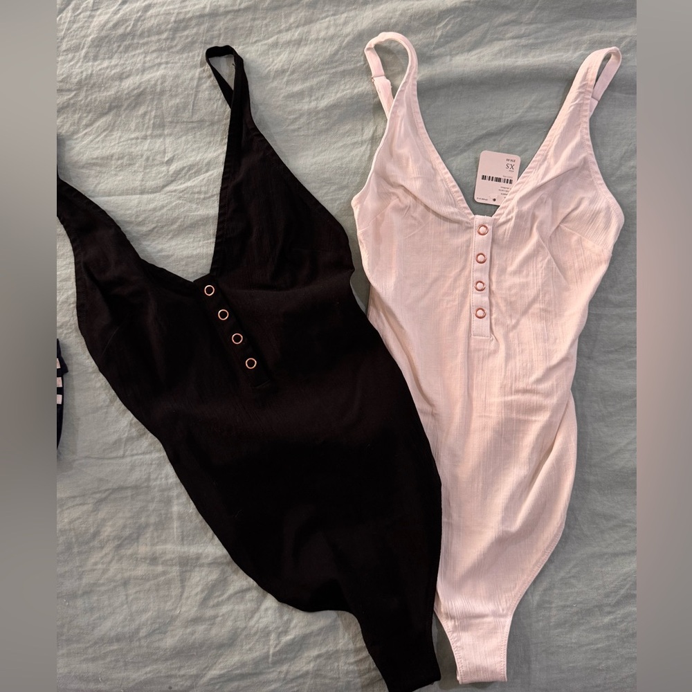 NWT Free People tank Bodysuits in black and white size XS